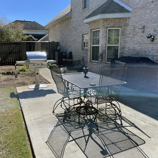 Large stone paver patio designed for outdoor entertaining in East Tennessee