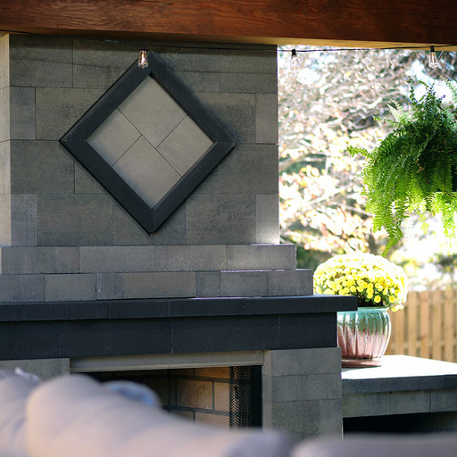 Outdoor stone fireplace and patio hardscape in East Tennessee